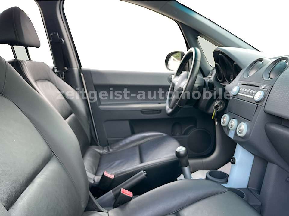 Mitsubishi Colt - Imagem 11